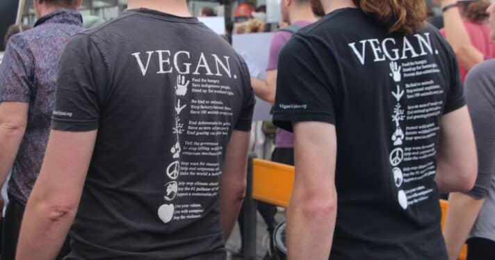 Two people with vegan shirts