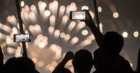 People taking pictures of fireworks