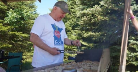 Tim Walz grills meat