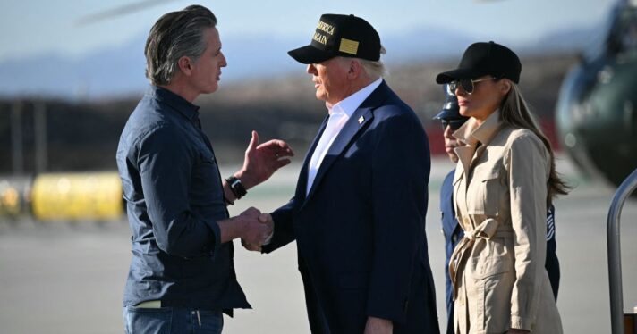 Donald Trump followed by First Lady Melania Trump, shakes hands with California Governor Gavin Newsom upon arrival at Los Angeles International Airport