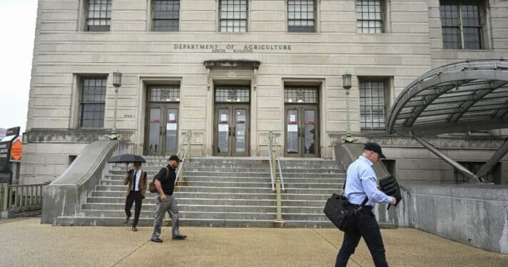 People outside the USDA building