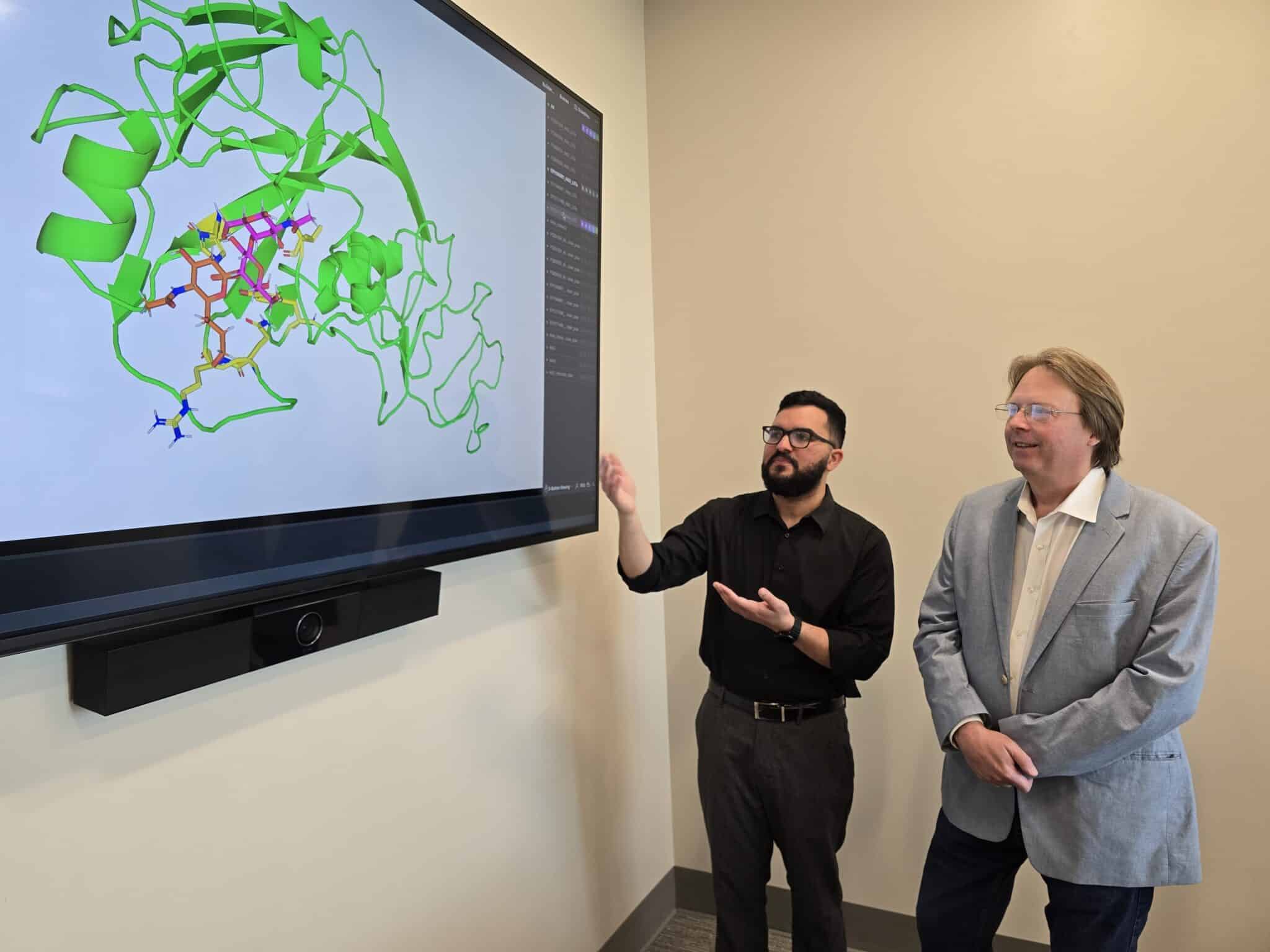 Sayal Guirales Medrano and Daniel Janies of the CIPHER center at UNC Charlotte examine the structures and interactions of H5N1 viral proteins.