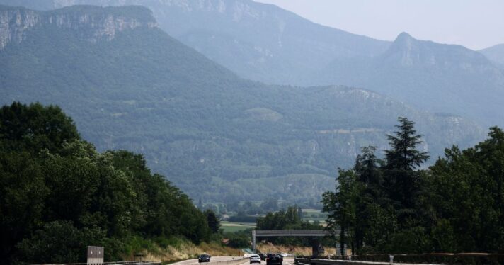 The valley of Grenoble and french alps' mountains engulfed in a haze caused by smoke from the intense forest fires in Canada that reached France, in Voiron, on June 14, 2025.