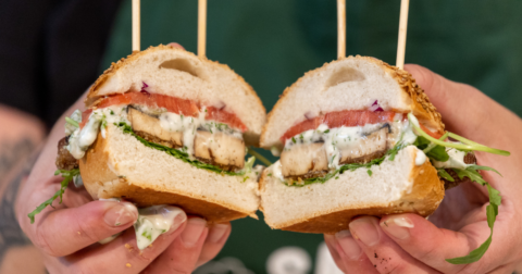 A vegan fish sandwich cut in half