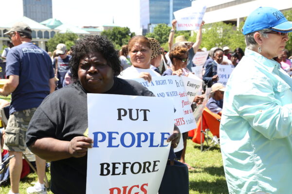 A protestor holding a sign