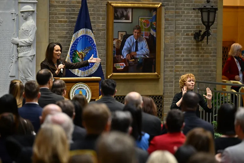 Brooke Rollins hosting a press conference