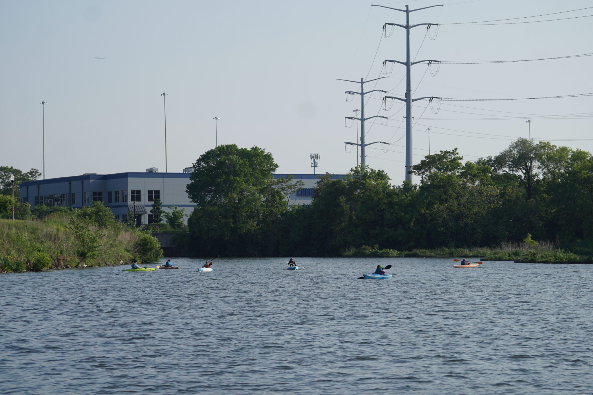 A group of kayakers on the water