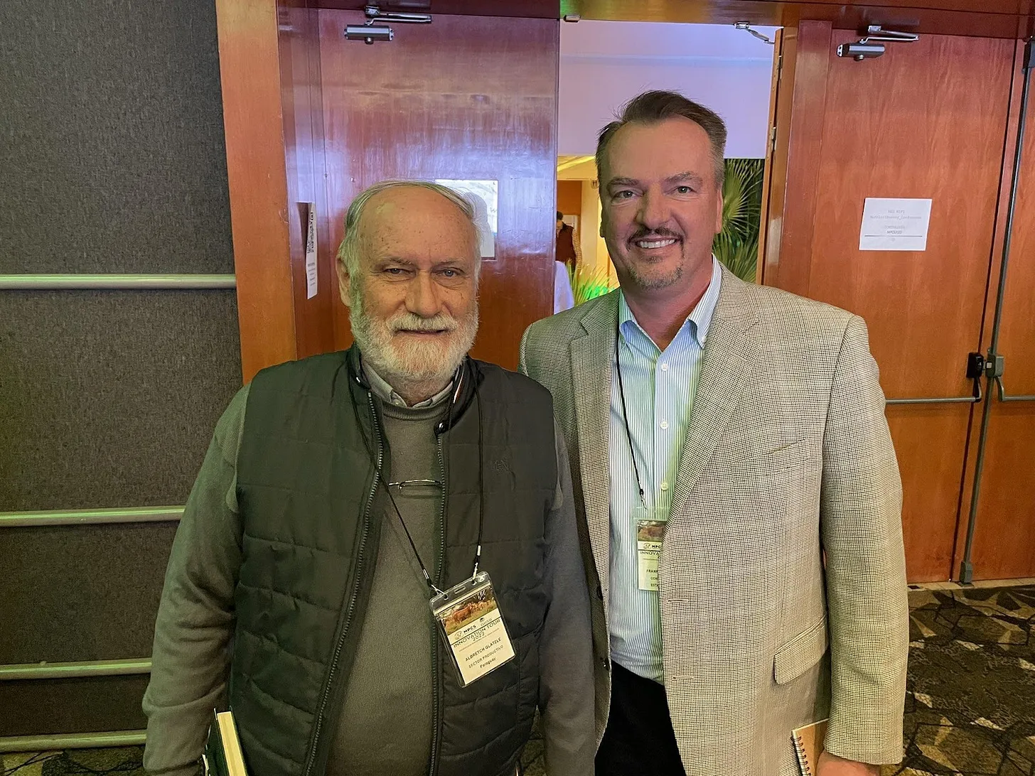 Two men standing together