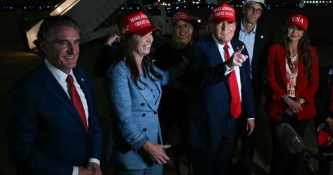 US Secretary of the Interior Doug Burgum, US Secretary of Agriculture Brooke Rollins, US Secretary of Homeland Security Kristi Noem watch US President Donald Trump talking to journalists