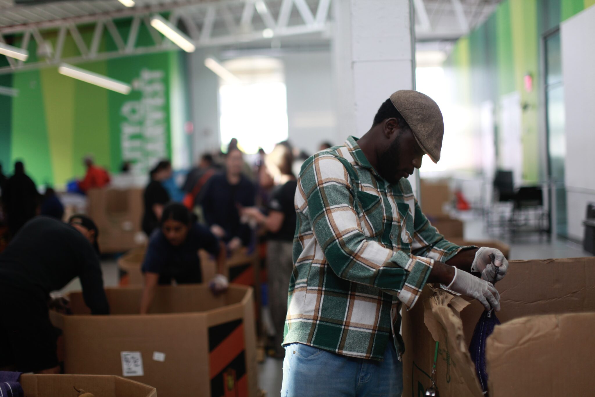 A volunteer sorting food