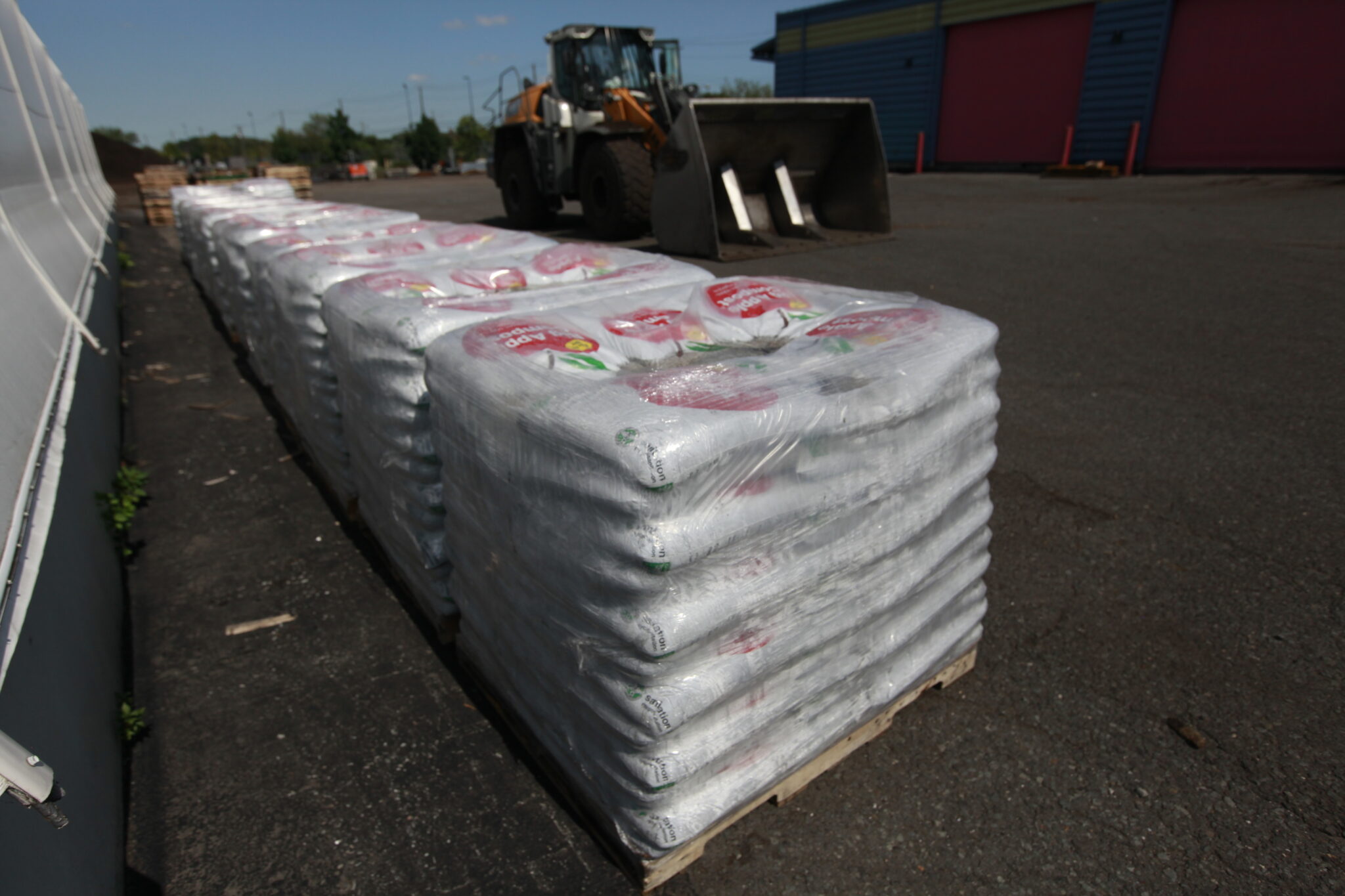 Bags of finished compost on pallets