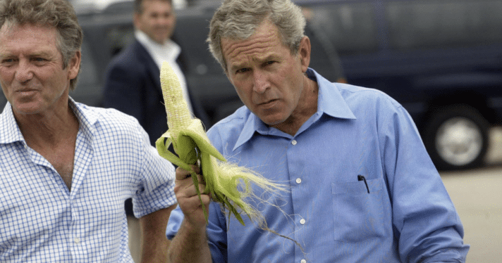 George W. Bush holding an ear of corn