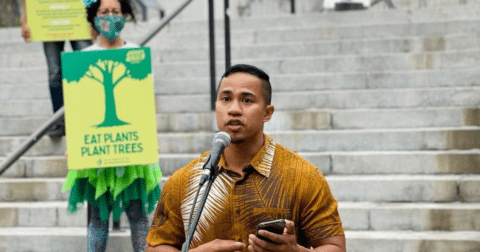 A man speaking into a microphone