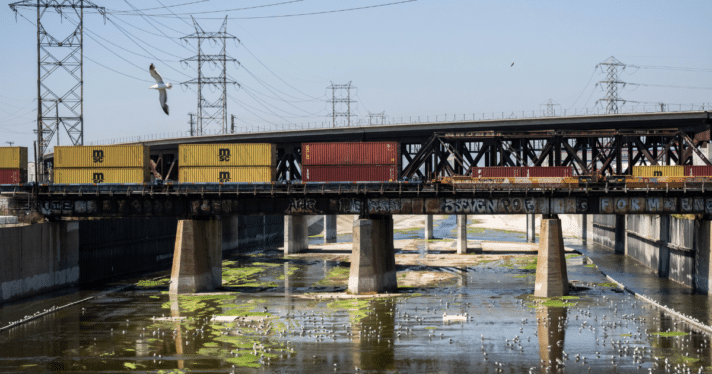 The Los Angeles River runs through the industrial city of Vernon where 50,000 workers come in and out every day to work in meatpacking and food processing facilities.