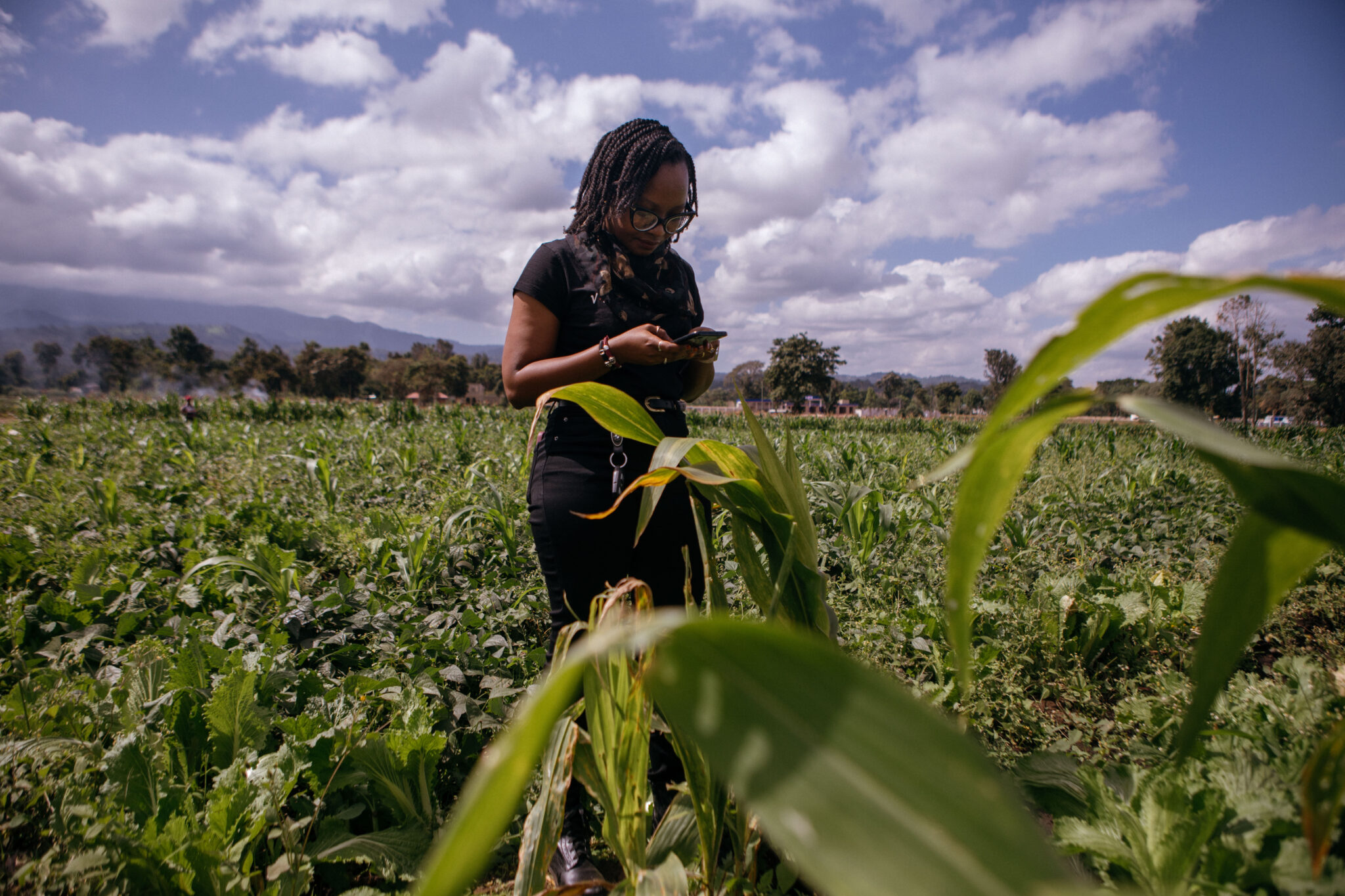 A woman standing in a field
