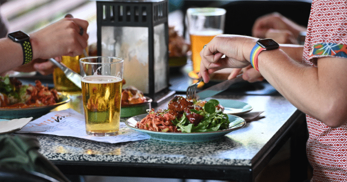 Two people eating at a restaurant