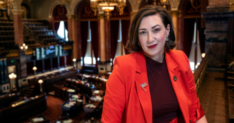 Iowa State Senator Catelin Drey standing in the State Senate Chambers