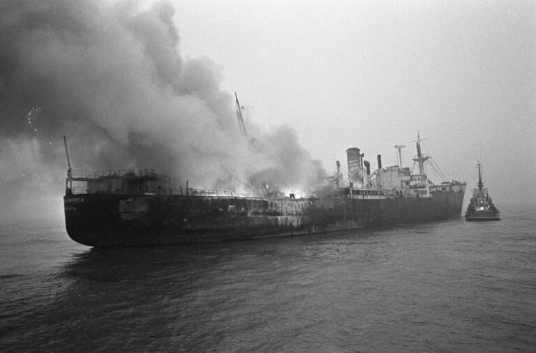 A ship at sea on fire